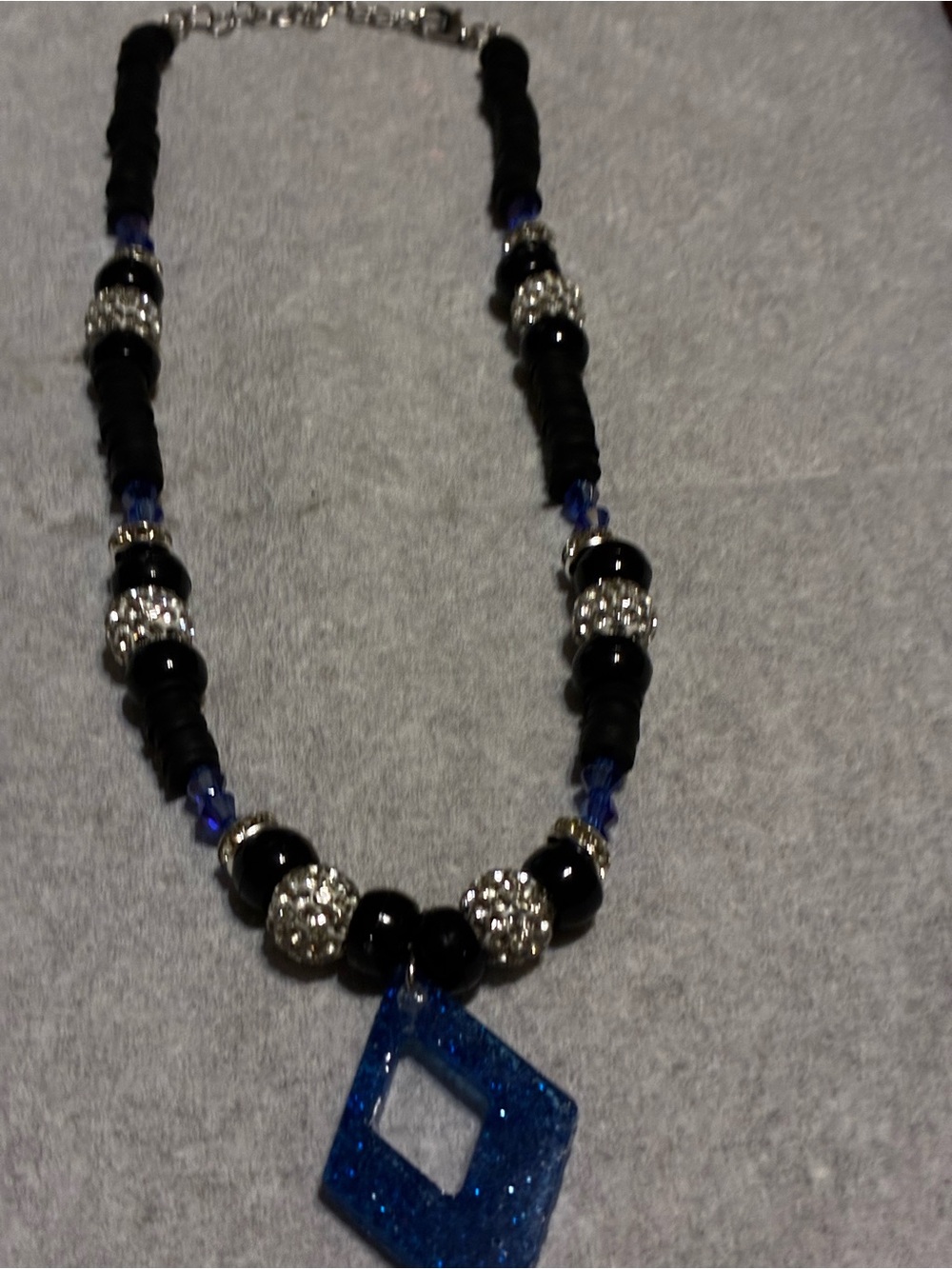 Sparkling Blue Geometric Pendant Necklace with Black Accents